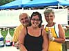 Megan and grandparents take a quick photo shot before getting hammered by the crowed at the snowball stand. Click here!